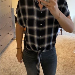 Bland and white plaid blouse